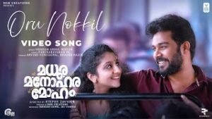Oru Nokkil Song